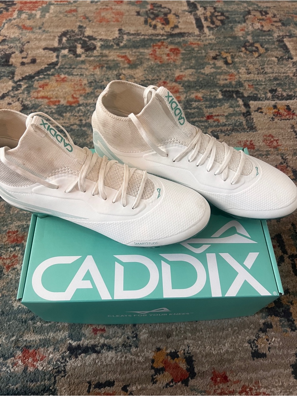 Women’s White and Teal Soccer/ Lacrosse Cleats